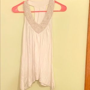 White flowy top with beaded neckline